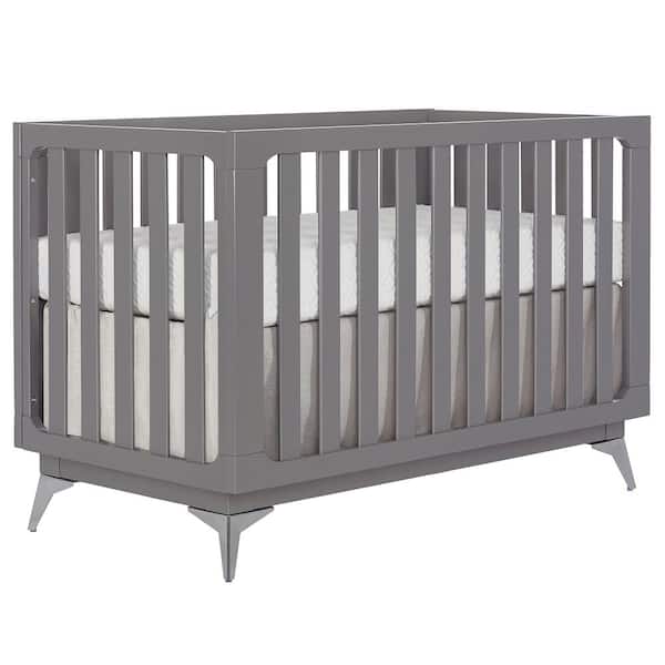 crib with sliding panel
