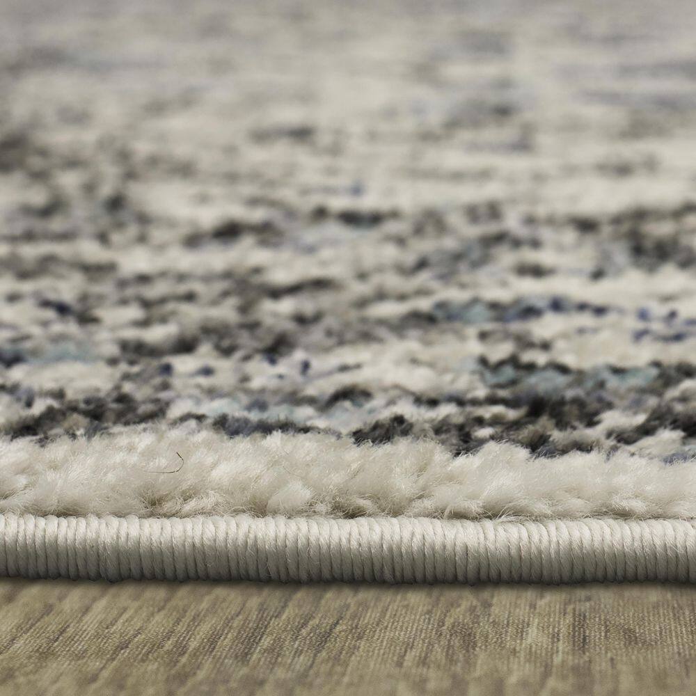 Bonilla Sky Blue Floral Synthetic Area Rug, 5'3" x 8'