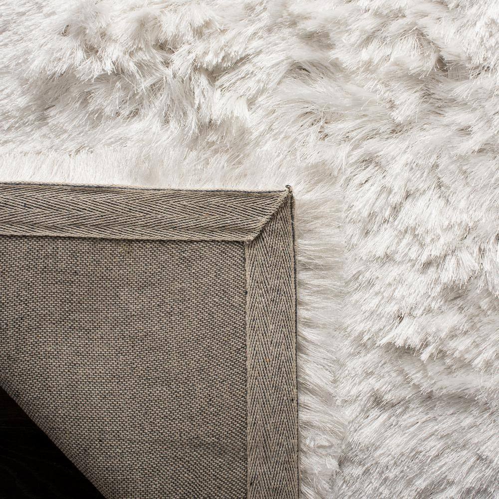 Ivory Hand-Tufted Shag Synthetic 9' x 12' Area Rug