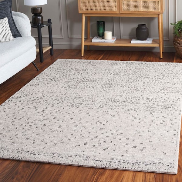 Northport 8 ft. x 10 ft. Ivory/Charcoal Spotted Distressed Area Rug