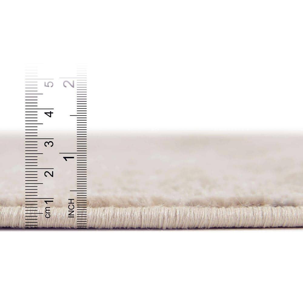 Ivory Round Polypropylene and Polyester Indoor Rug