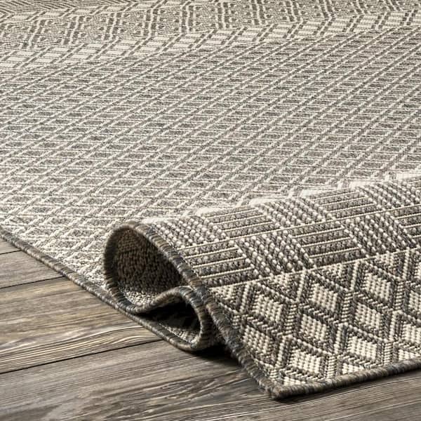 https://images.thdstatic.com/productImages/2c7cf4a0-448d-4d0a-abb6-e6fc13355c8f/svn/light-gray-nuloom-outdoor-rugs-owfr01b-6709-1d_600.jpg