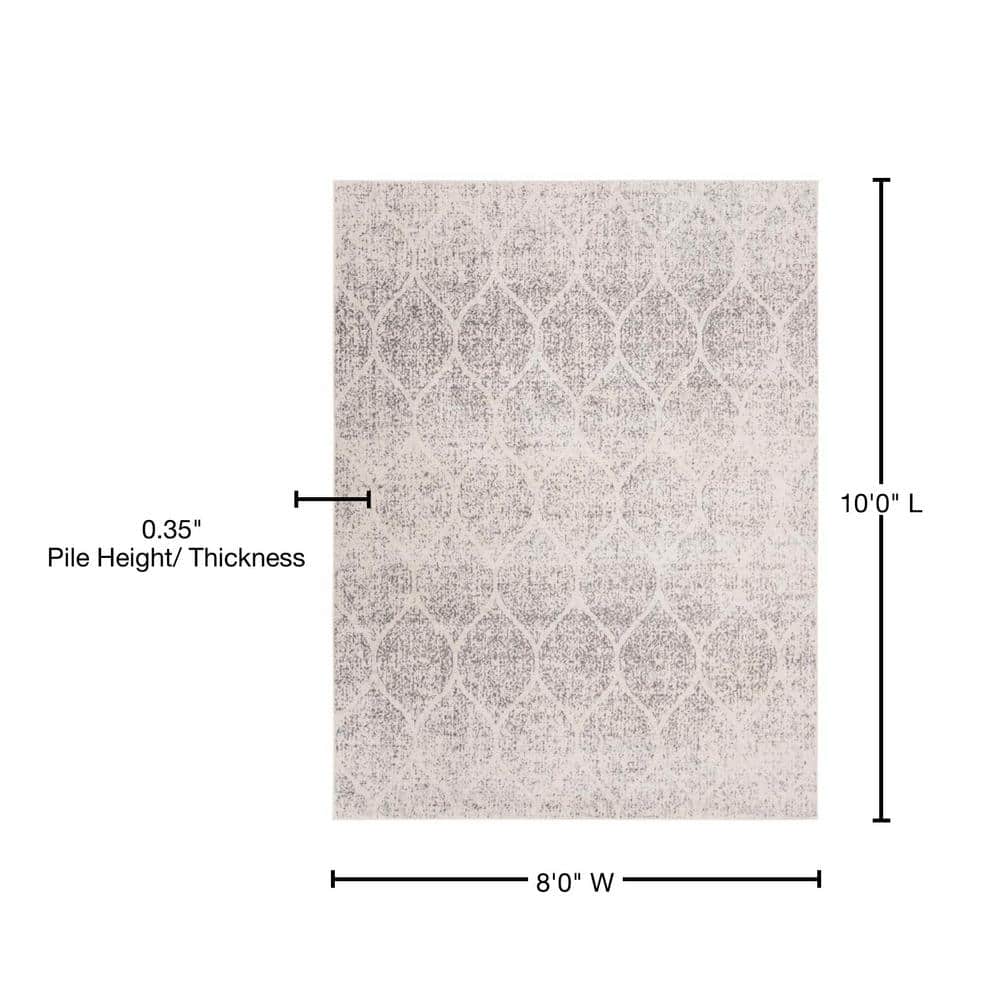 Ivory and Silver Geometric 8' x 10' Synthetic Area Rug