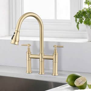 Double-Handle Bridge Kitchen Faucet with Pull-Down Sprayhead in Brushed Gold