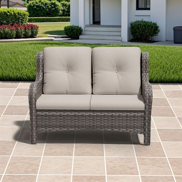 Brown Wicker Outdoor Patio Loveseat with Beige Cushions
