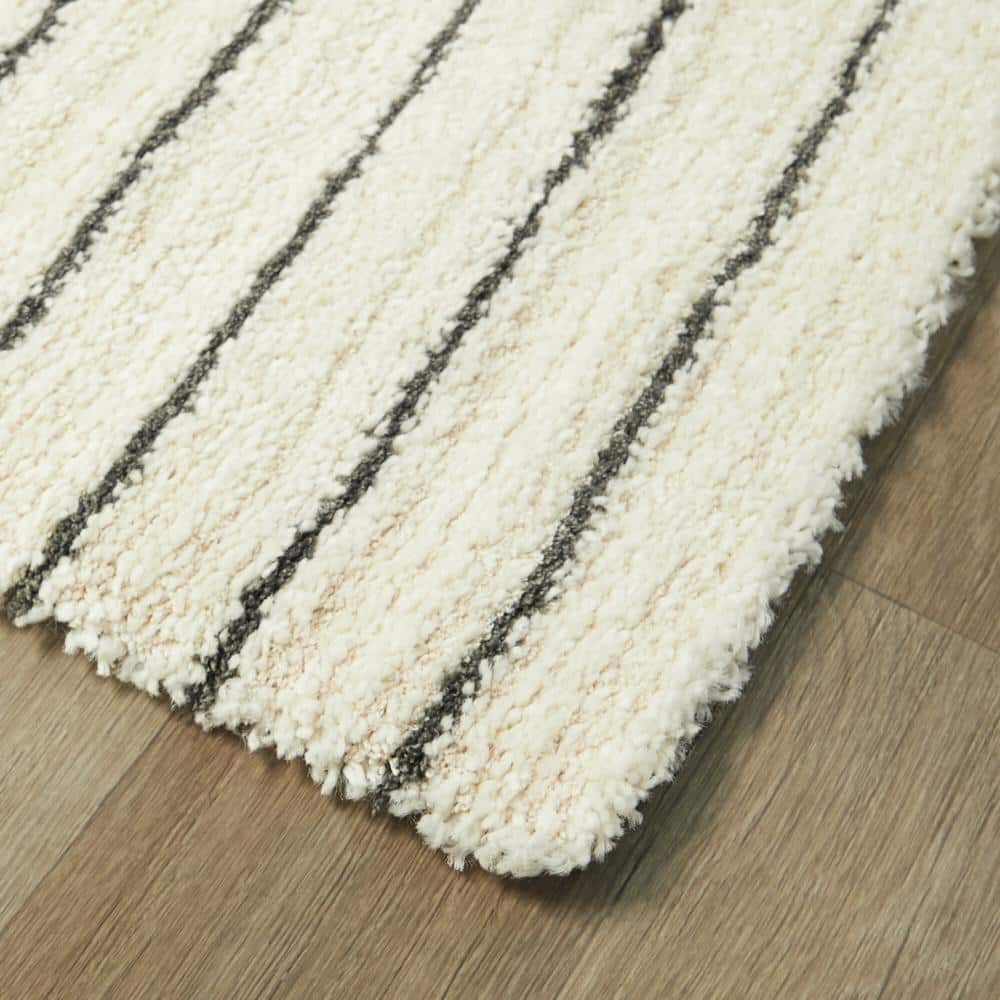 Cream Geometric Synthetic 4' x 6' Area Rug