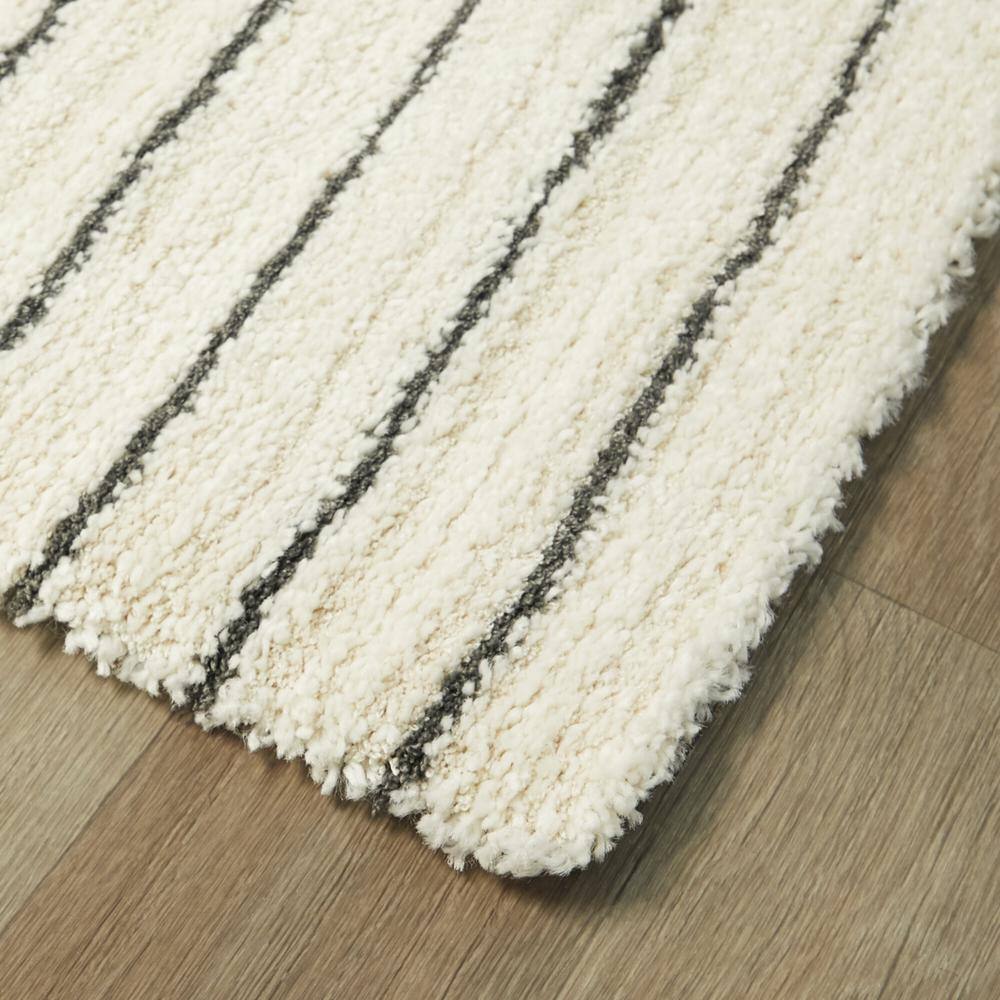 Cream Geometric Synthetic Rectangular Area Rug 6 x 9 ft