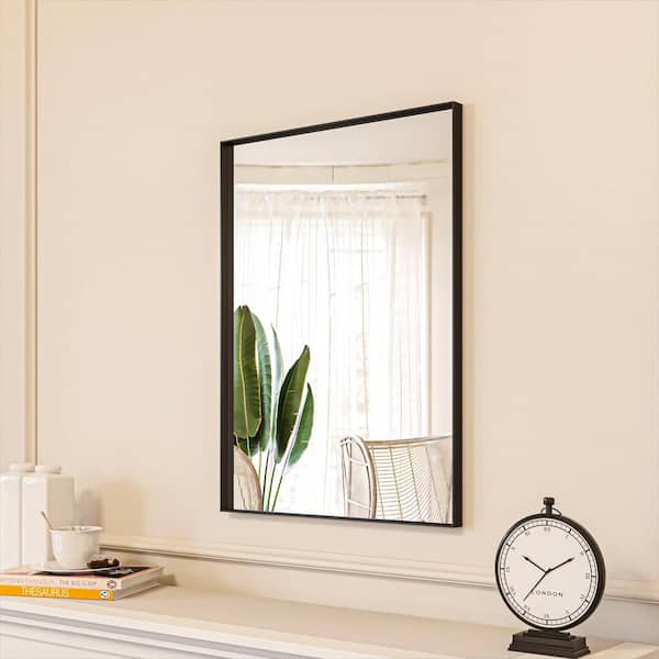 22 in. W x 30 in. H Black Aluminum Rectangle Framed Tempered Glass Wall-mounted Mirror