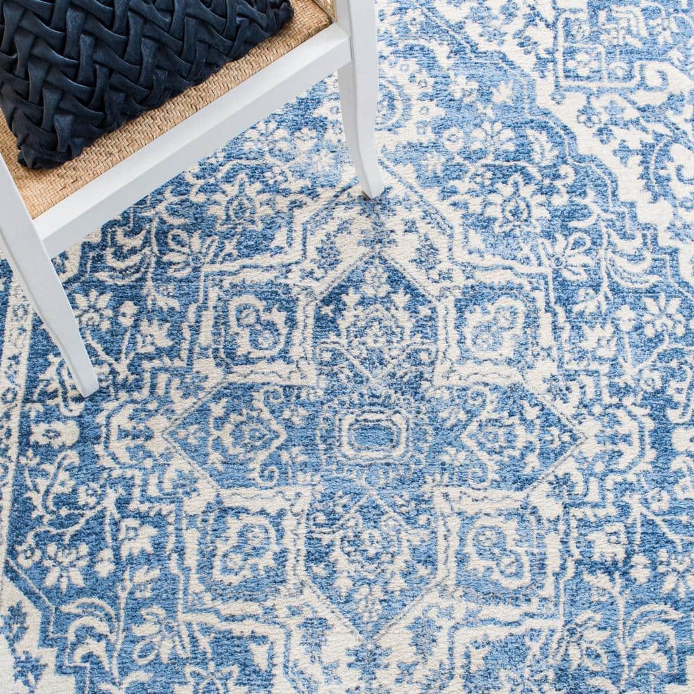 Ivory and Navy 8' x 10' Synthetic Washable Reversible Area Rug