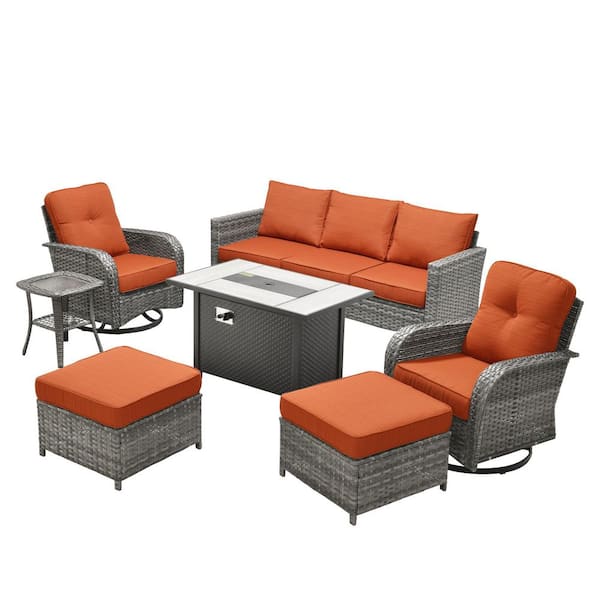 Daphne 7-Piece Wicker Patio Conversation Sofa Swivel Rocking Chairs Set with Metal Fire Pit and Orange Red Cushions