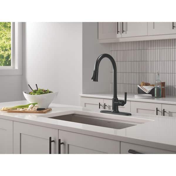 Delta Tolmac Single Handle Pull Down Sprayer Kitchen Faucet in