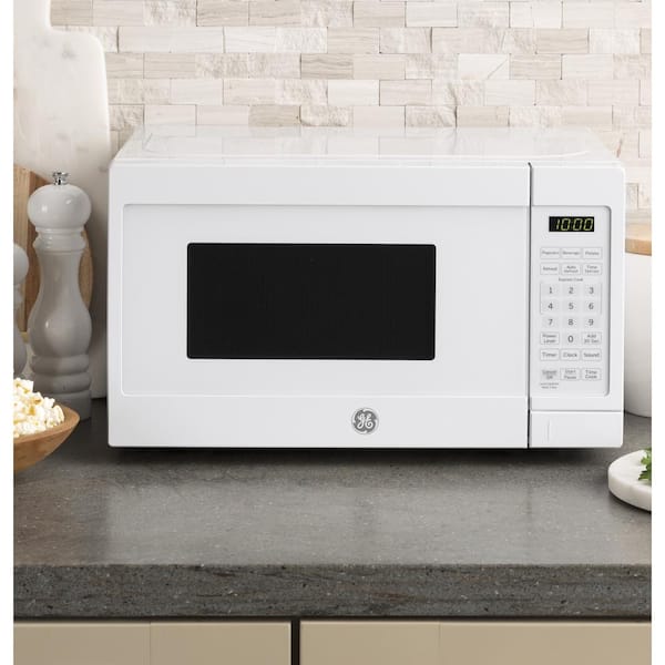 0.7 cu. ft. 700-Watt Spacemaker Countertop Microwave in White