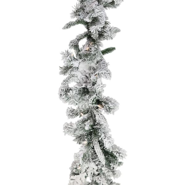 9 ft. Green Battery Operated Prelit Mountain Pine Flocked Artificial Christmas Garland with 50 Warm White LED Lights