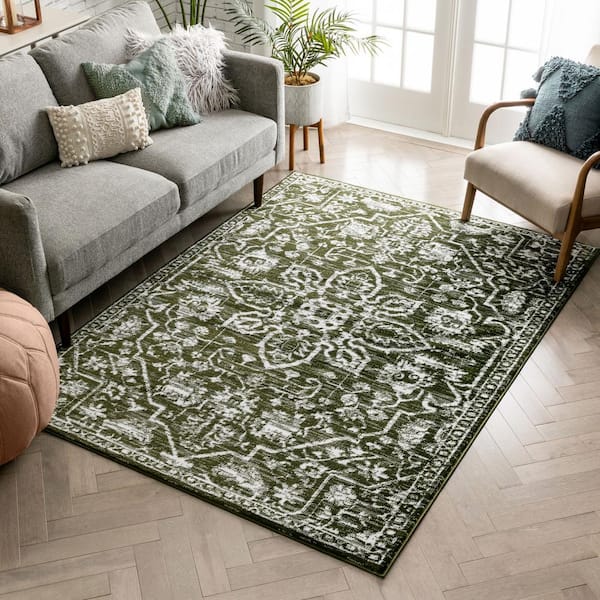 https://images.thdstatic.com/productImages/2cf4f4d7-f1f7-4600-b748-7236b77f0bbe/svn/green-well-woven-area-rugs-dz-05-4-e1_600.jpg