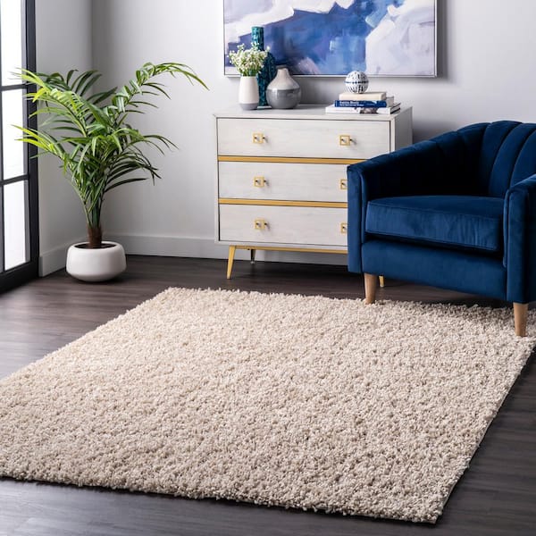 Kara Solid Shag Beige 6 ft. 7 in. x 9 ft. Indoor Area Rug