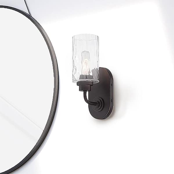 Gramercy Park 4.75 in. 1-Light Old English Bronze Rustic Wall Sconce with Clear Hammered Glass Shade