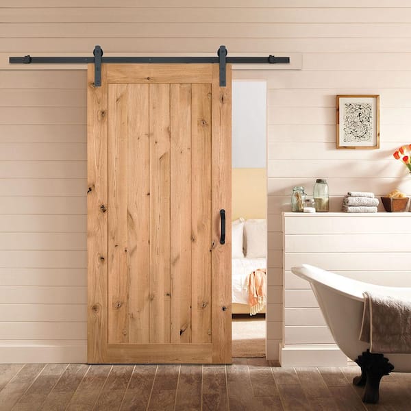 https://images.thdstatic.com/productImages/2cfb6d8c-4187-4b00-831e-e19f639224c7/svn/knotty-alder-masonite-barn-doors-81775-31_600.jpg