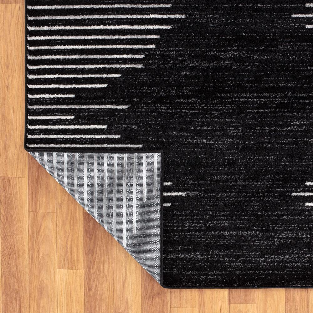 Bohemian Black and White Stripe Synthetic Runner Rug 2' x 7'