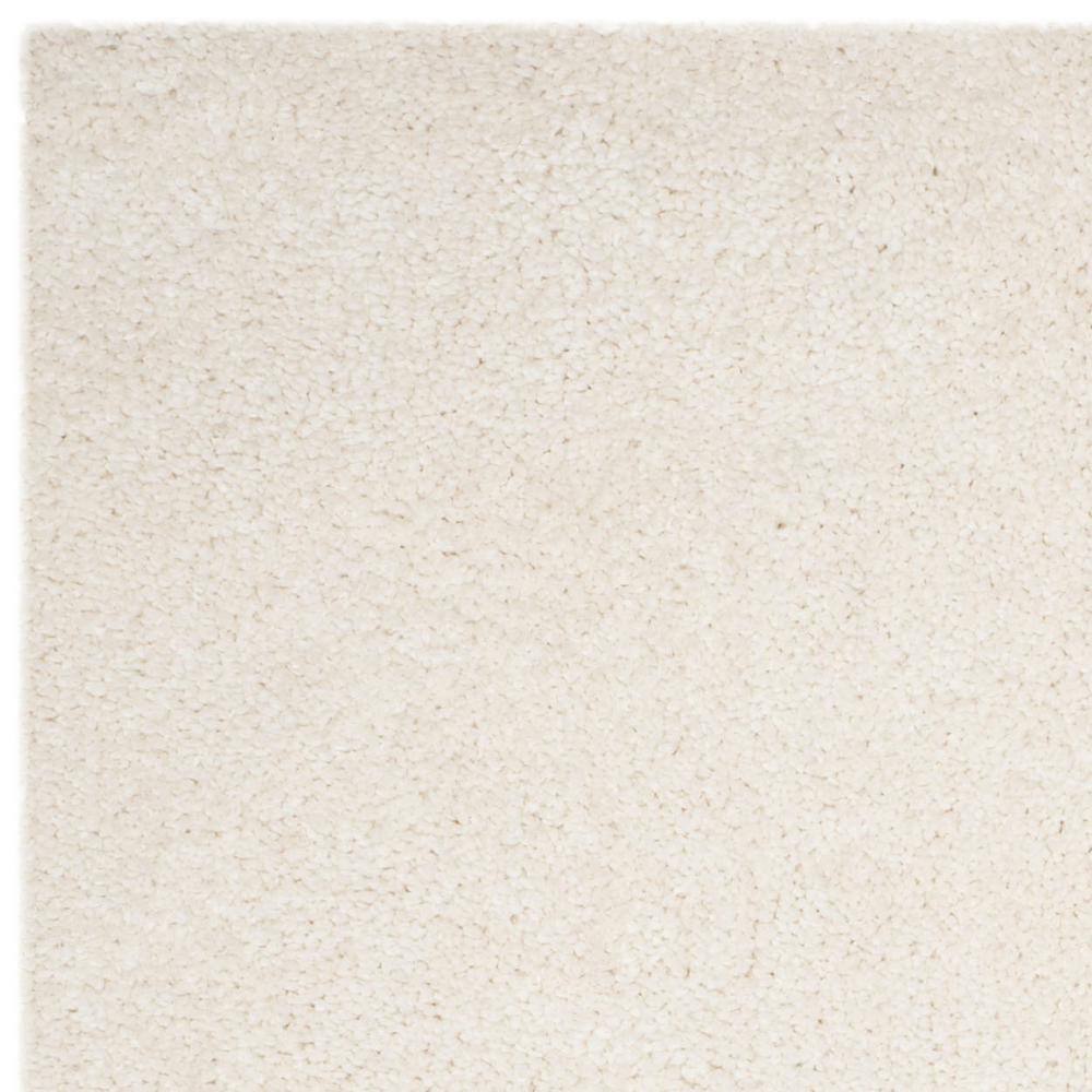 Ivory Handmade Tufted Shag Area Rug, 8' x 10'