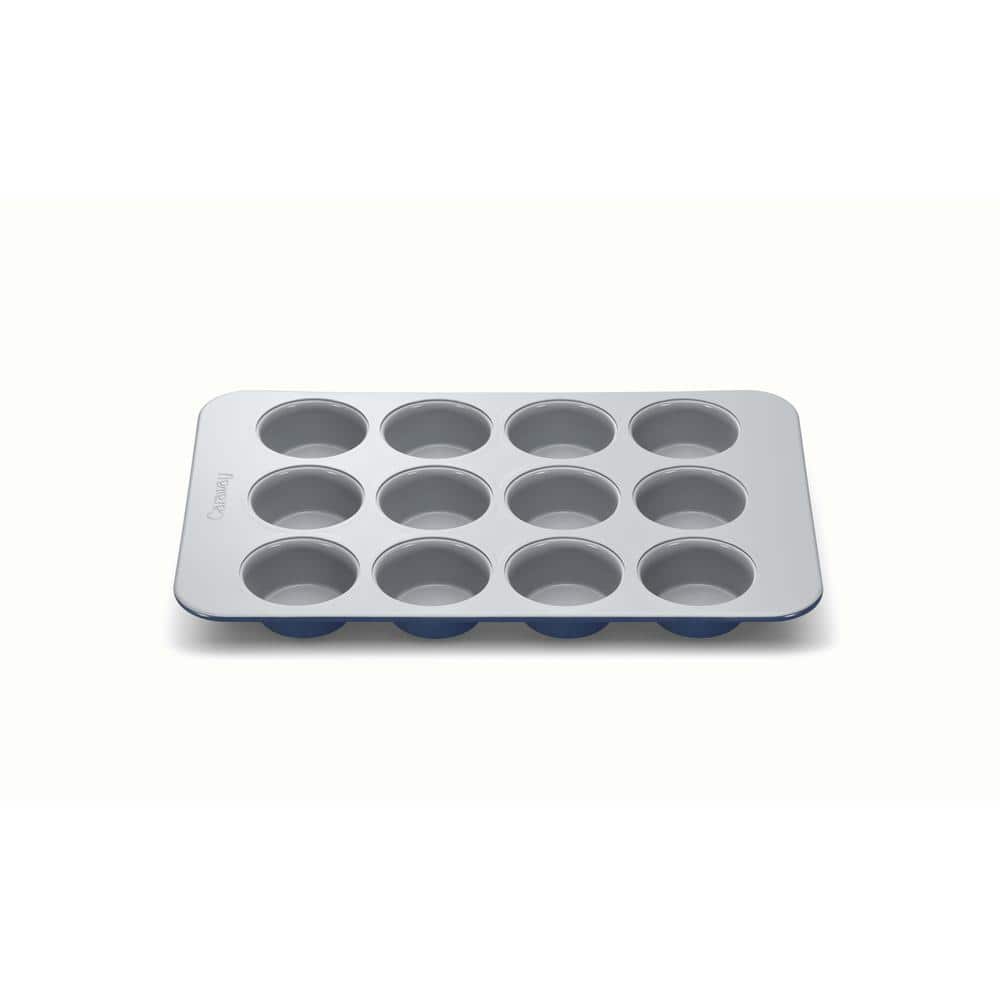 https://images.thdstatic.com/productImages/2d1250bc-5f87-43c3-a495-8de4cf936ad2/svn/navy-caraway-home-cupcake-pans-muffin-pans-bw-mffn-nvy-64_1000.jpg