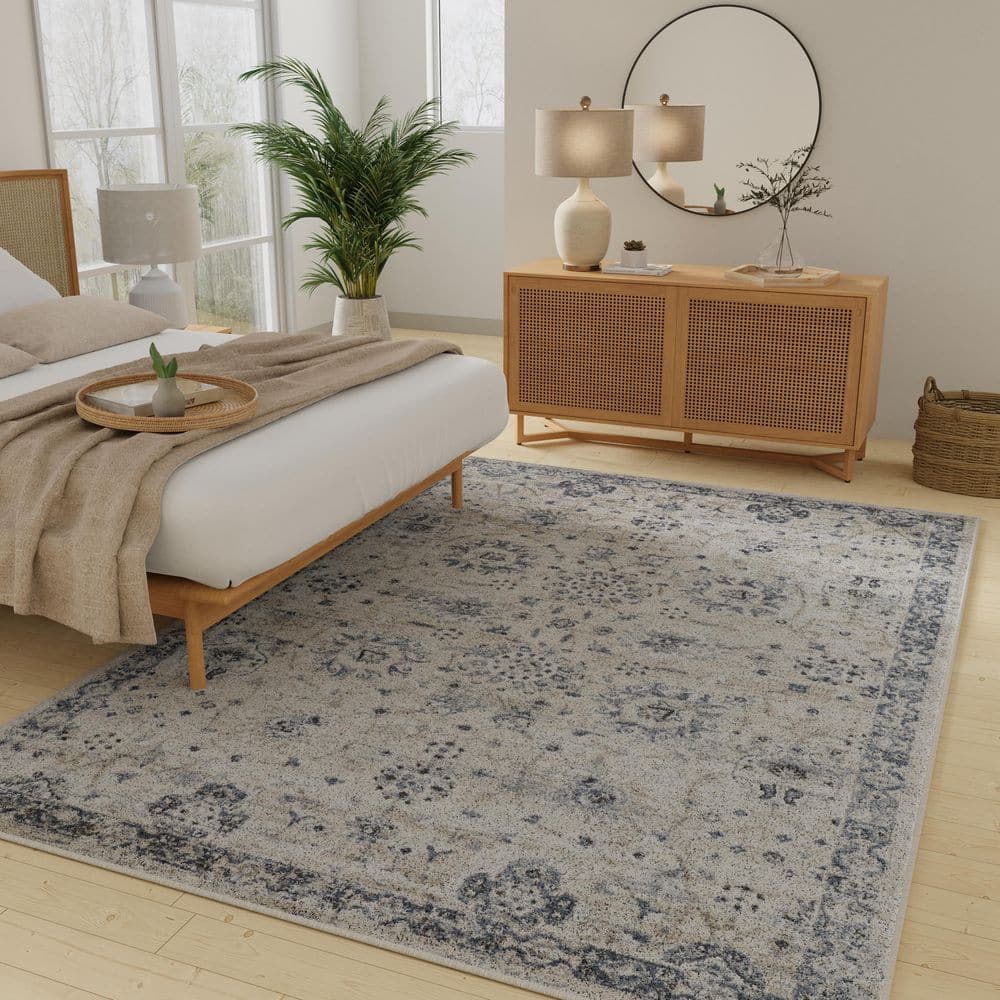 Kehleigh Aylesh 9' x 12' Blue and Cream Synthetic Area Rug