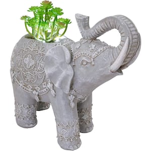 1-Light 9 in. Integrated LED Solar Powered Elephant with Green Plant