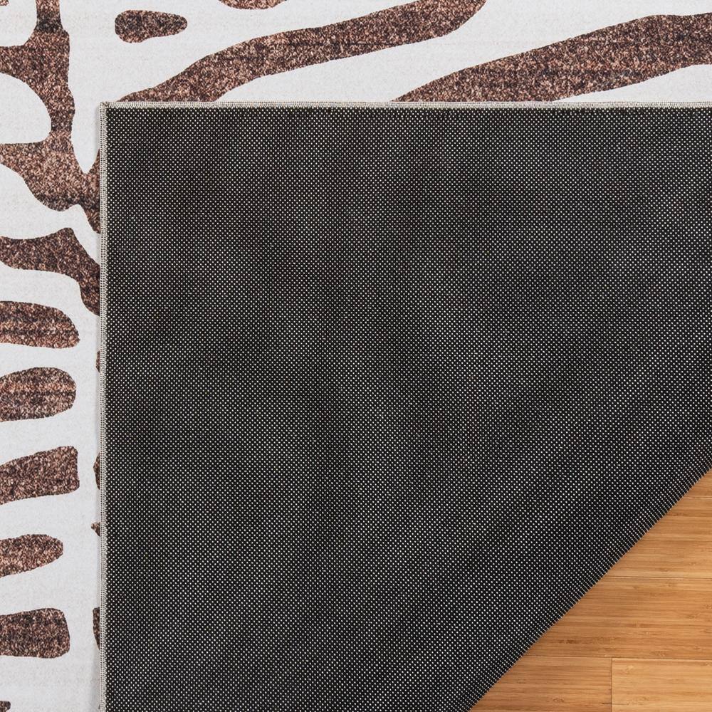 Ivory and Brown Zebra Print 8' x 10' Synthetic Area Rug