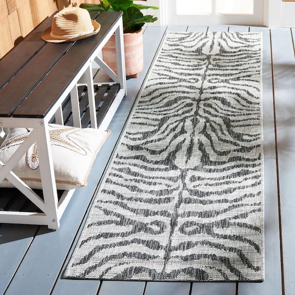 Courtyard Gray/Black 2 ft. x 7 ft. Zebra Indoor/Outdoor Patio  Runner Rug