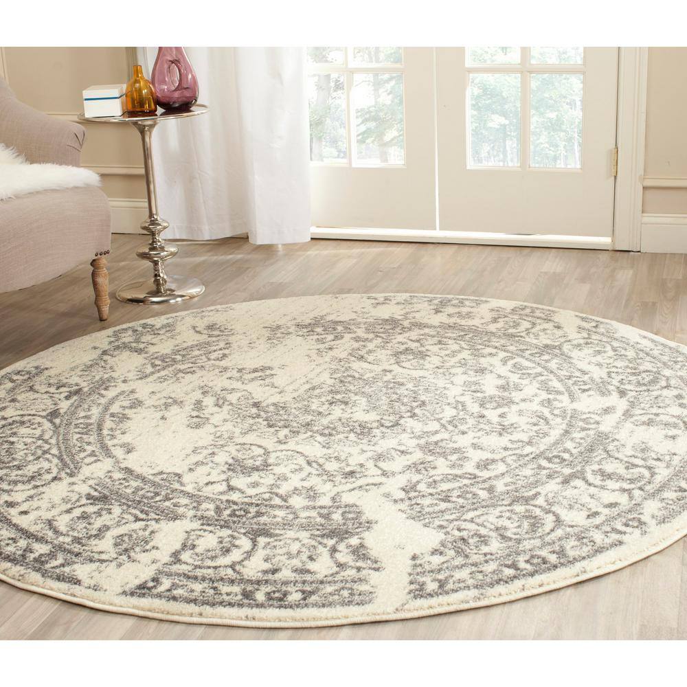 Chic Ivory & Silver 6' Round Synthetic Easy-Care Area Rug