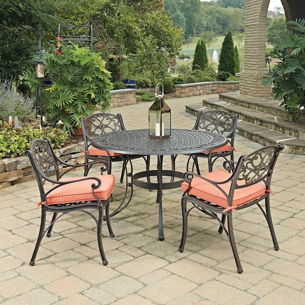 HOMESTYLES Sanibel Rust Bronze 5-Piece Cast Aluminium Outdoor Dining Set with Coral Cushions