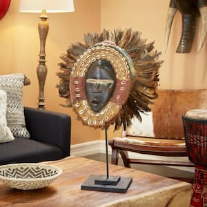 19 in. x 33 in. Brown Hand-Carved Baobab Wood, Chicken Feathers and Cowrie Shell Dan Mask on Stand