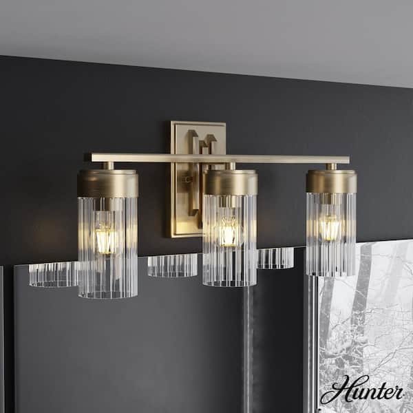 Hunter Gatz 22.25 in. 3-Light Alturas Gold Vanity Light with Ribbed Glass Shades