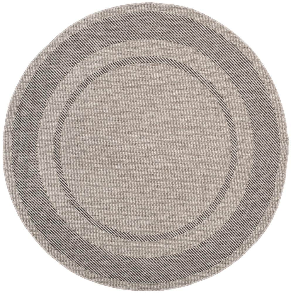 Courtyard Beige/Black 7 ft. x 7 ft. Round Striped Indoor/Outdoor Patio  Area Rug price history on PriceWatchPro