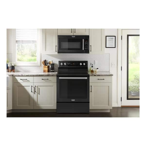 https://images.thdstatic.com/productImages/2d787ad8-9306-42bf-b8aa-e91132dea073/svn/cast-iron-black-maytag-over-the-range-microwaves-mmv5227jk-31_600.jpg