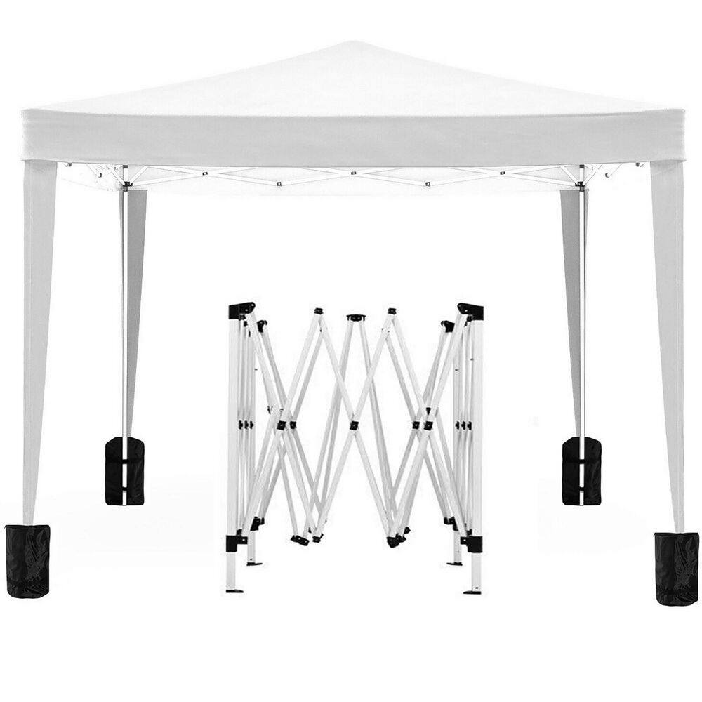 10 ft. x 10 ft. White EZ Pop Up Canopy Outdoor Portable Party Folding Tent with 4 Removable Sidewalls and Carry Bag