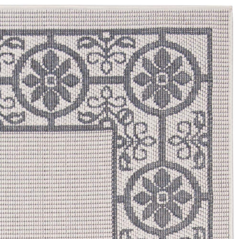 Ivory & Charcoal Geometric 8' x 10' Easy-Care Synthetic Area Rug