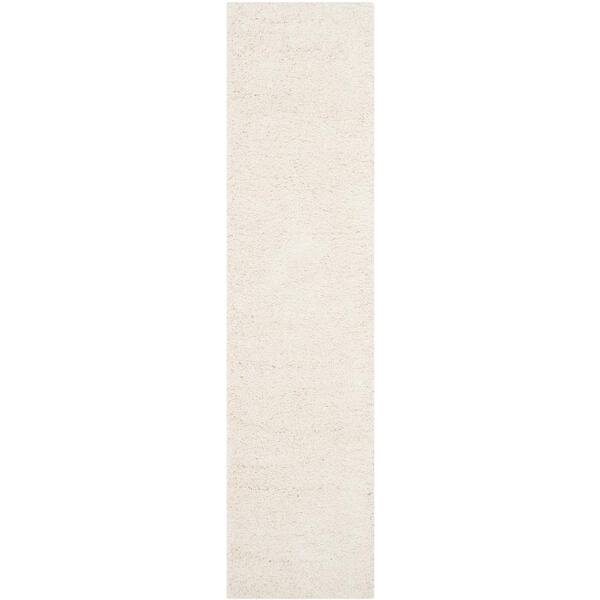 SAFAVIEH Milan Shag Ivory 2 ft. x 10 ft. Solid Flokati Runner Rug