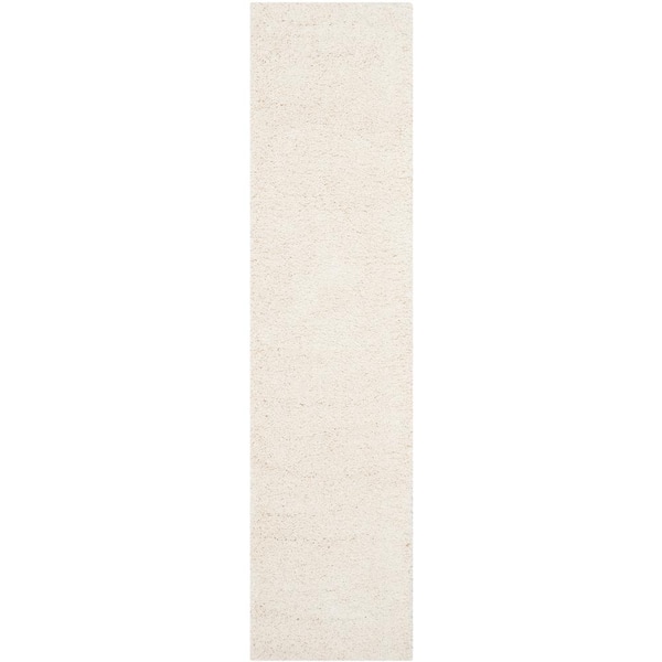 Milan Shag 2 ft. x 12 ft. Ivory Solid Runner Rug