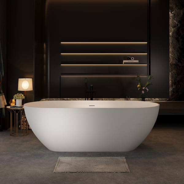 62.9 in. x 29.52 in. Contemporary Oval Solid Surface Soaking Bath Tub Stone Resin Freestanding Bathtub in Matte White