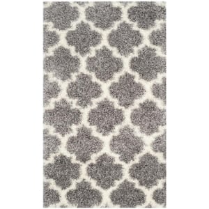 https://images.thdstatic.com/productImages/2dd6a846-62ea-408d-8917-e9cbf61e27ce/svn/gray-ivory-safavieh-area-rugs-sgm832d-3-64_300.jpg