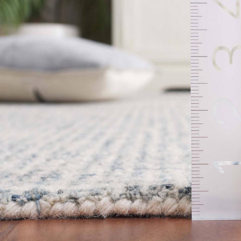 Handmade Blue and Ivory Wool Blend Tufted Rectangular Rug 3' x 5'