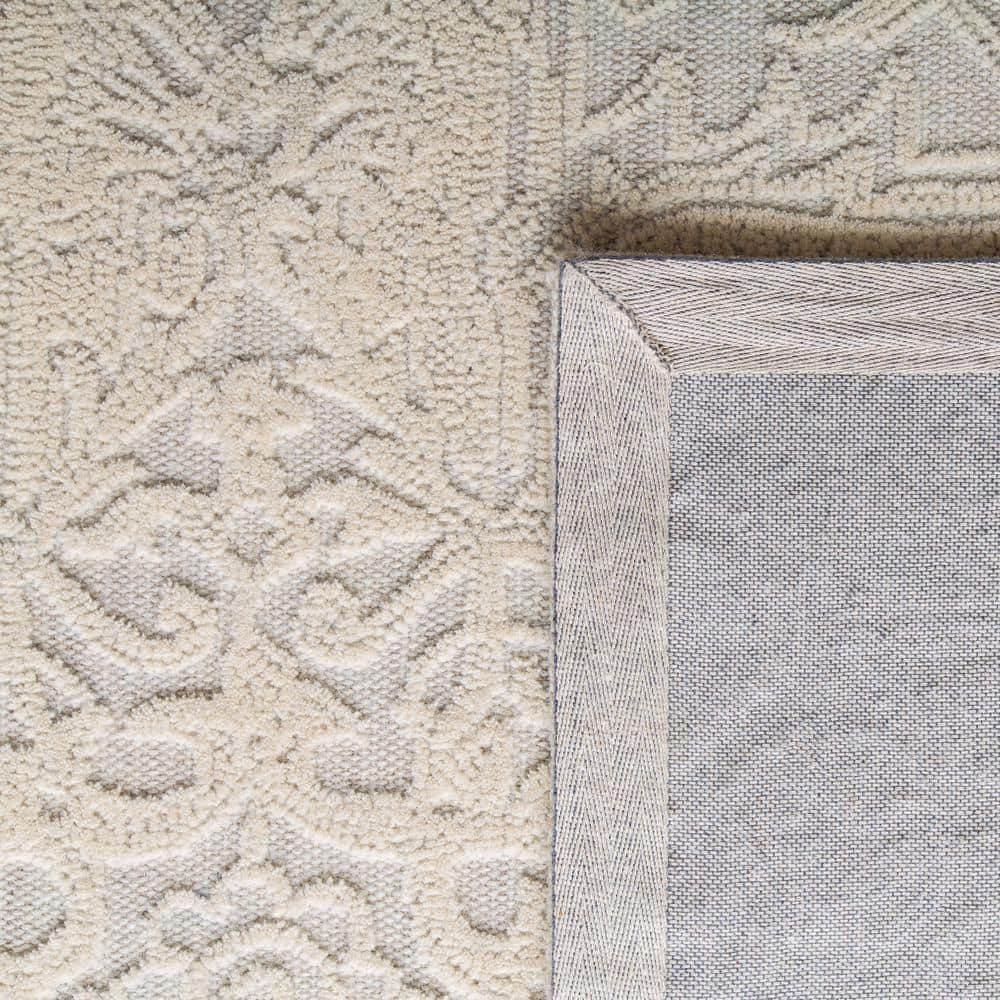 Ivory and Beige 4' x 6' Handmade Wool Abstract Tufted Rug