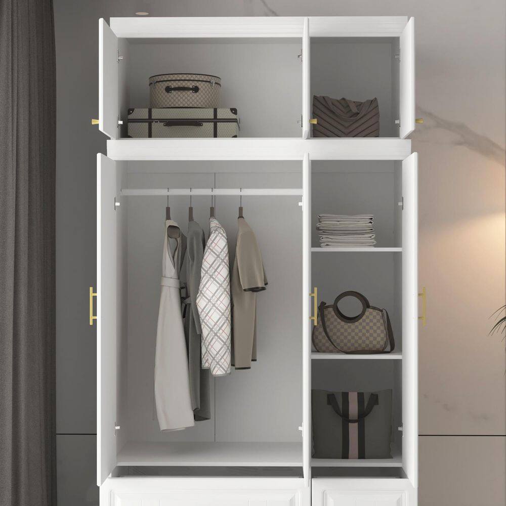 Close-up of the open white wardrobe armoire interior.