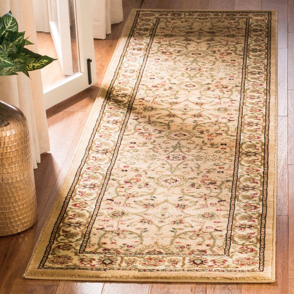 Handmade Ivory Floral Rectangular Synthetic Area Rug