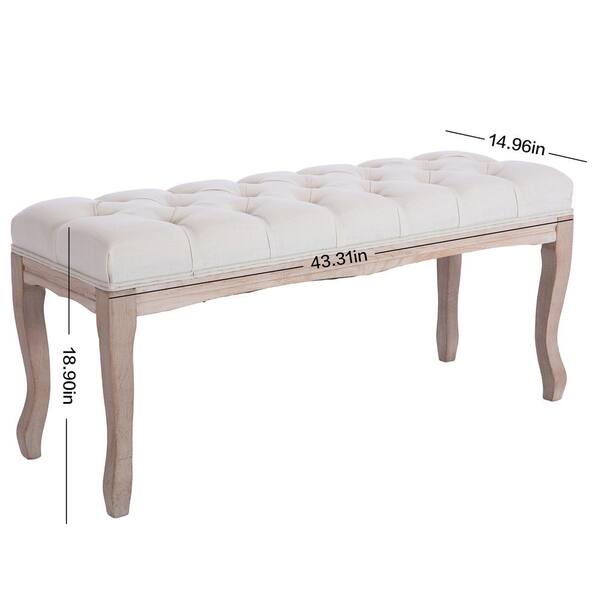 beige upholstered bench