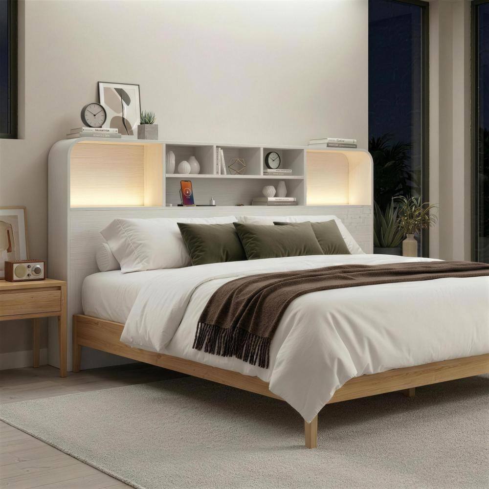 White modern wooden bookcase headboard with LED lighting in a bedroom setting.