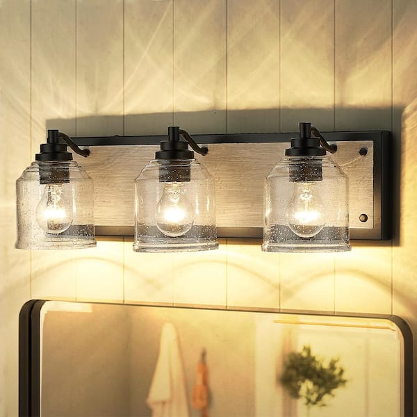 pasentel Farmhouse 23 in. 3-Light Black and Grey Wood Grain Metal Bathroom Vanity Light with Clear Seeded Glass Shades