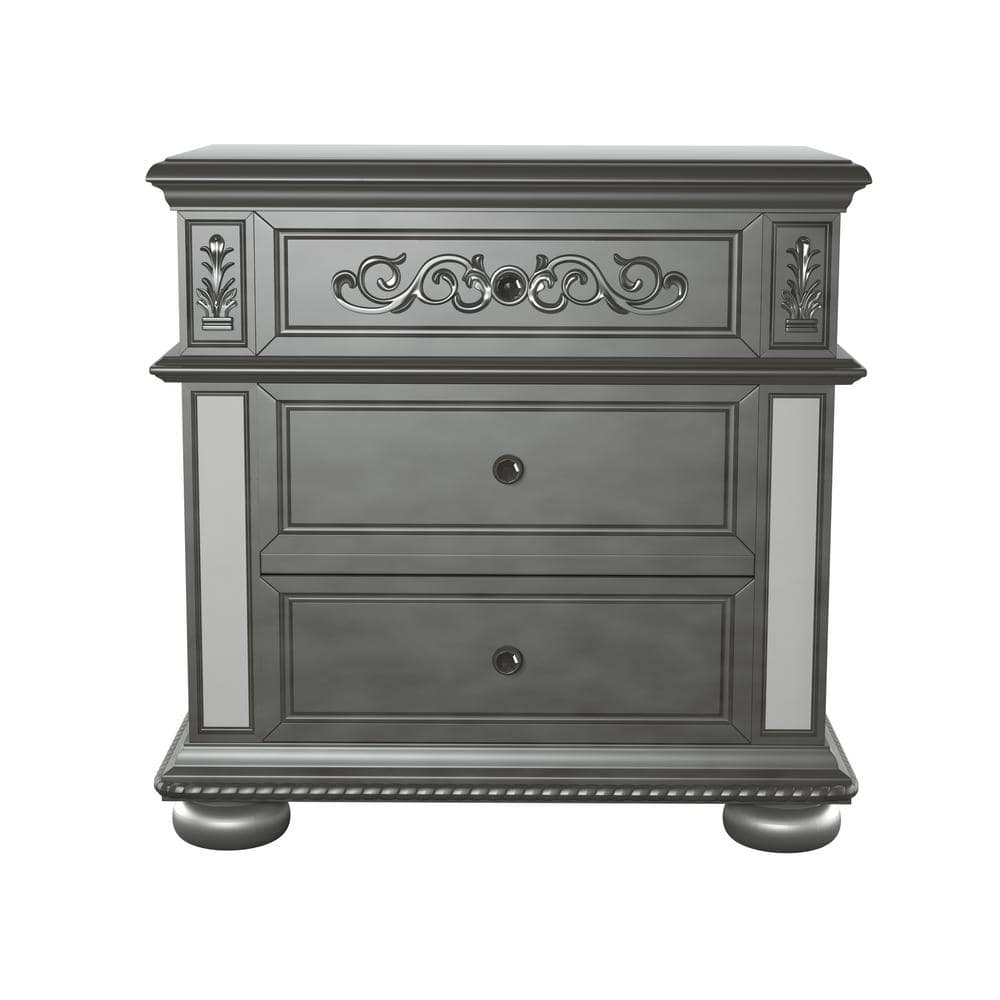 black nightstand with silver knobs