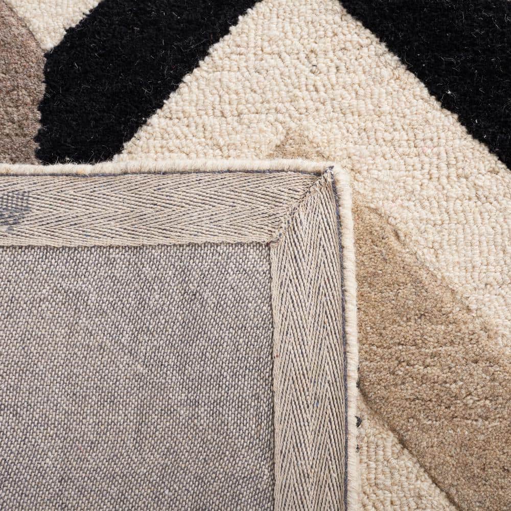 Ivory and Black Hand-Tufted Wool 6' x 9' Rectangular Area Rug