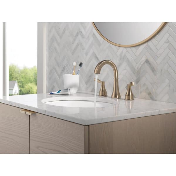 Faryn Gold 8 in. Widespread Double Handle Bathroom Faucet in Champagne Bronze